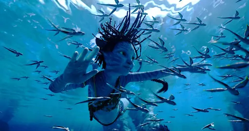 This image released by 20th Century Studios shows Trinity Bliss, as Tuk, in a scene from "Avatar: The Way of Water." (20th Century Studios via AP)