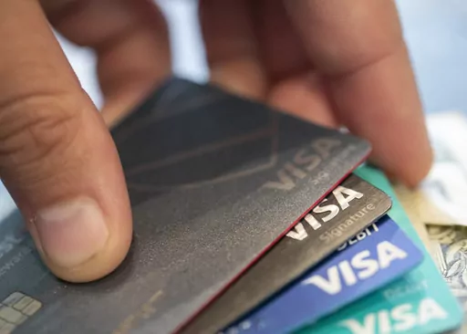 This Aug. 11, 2019 file photo shows Visa credit cards in New Orleans. So-called alternative credit cards from financial technology companies can offer you the opportunity to build credit when your options are limited, and they tend to lower or eliminate many barriers along that path. But they aren’t without their potential drawbacks. (AP Photo/Jenny Kane, File)