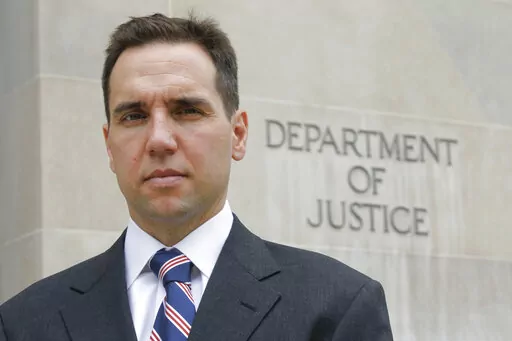 Jack Smith, the Department of Justice's chief of the Public Integrity Section, poses for a photo at the Department of Justice in Washington, Aug. 24, 2010. Smith, the prosecutor named as special counsel to oversee investigations related to former President Donald Trump, has a long career confronting public corruption and war crimes. (AP Photo/Charles Dharapak, File)