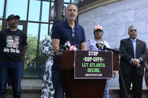 Community organizer Kamau Franklin speaks during a news conference outside Atlanta's City Hall, Wednesday, June 7, 2023, to announce an effort to force a referendum that would allow Atlanta voters to decide whether the construction of a proposed police and firefighter training center should proceed. Under the proposed referendum, voters would choose whether they want to repeal the ordinance that authorized the lease of the city-owned land upon which the project, which opponents call Cop City, is