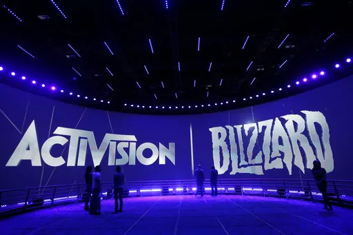 The Activision Blizzard Booth during the Electronic Entertainment Expo in Los Angeles, June 13, 2013. The Federal Trade Commission said Thursday, Dec. 8, 2022, that it is suing to block Microsoft’s planned $69 billion takeover of video game company Activision Blizzard, saying it could suppress competitors to its Xbox game consoles and its growing games subscription business. (AP Photo/Jae C. Hong, File)