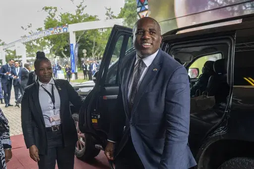 British Foreign Secretary David Lammy arrives for the opening session of the G20 foreign ministers meeting in Johannesburg, South Africa, Thursday, Feb. 20, 2025. (AP Photo/Jerome Delay)