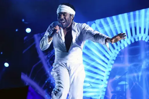 Donald Glover, who goes by the stage name Childish Gambino, performs at the Governors Ball Music Festival in New York on June 3, 2017. Childish Gambino will release his sixth studio album, “Bardo Stone & the New World,” on Friday. (Photo by Charles Sykes/Invision/AP, File)