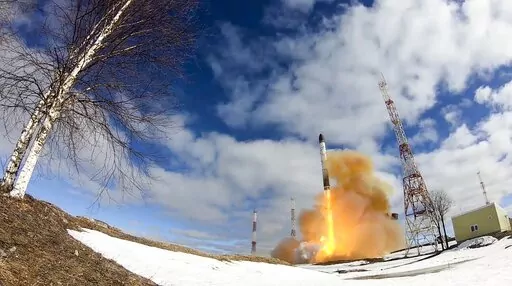 In this handout photo released by Russian Defense Ministry Press Service on Wednesday, April 20, 2022, the Sarmat intercontinental ballistic missile is launched from Plesetsk in Russia's northwest. Russia said on Wednesday it had conducted a first test launch of its Sarmat intercontinental ballistic missile, a new and long-awaited addition to its nuclear arsenal which President Vladimir Putin said would make Moscow's enemies stop and think. (Russian Defense Ministry Press Service via AP)