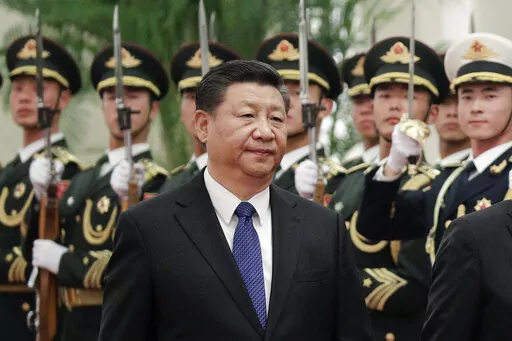 Chinese President Xi Jinping and Finnish President Sauli Niinisto (unseen) review an honor guard at the Great Hall of the People in Beijing, Monday, Jan. 14, 2019. With Russia’s military failings in Ukraine mounting, no country is paying closer attention than China to how a smaller, outgunned force has badly bloodied what was thought to be one of the world’s strongest armies. (AP Photo/Andy Wong, File)