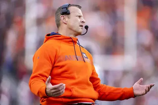 Auburn head coach Bryan Harsin reacts to a call during the first half of an NCAA college football game against Alabama, Saturday, Nov. 27, 2021, in Auburn, Ala. (AP Photo/Vasha Hunt)