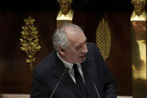 French Prime Minister Francois Bayrou delivers his general policy speech, Tuesday, Jan. 14, 2025 at the National Assembly in Paris. (AP Photo/Thibault Camus)