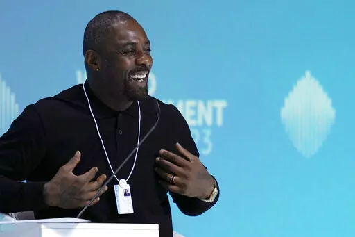 British actor Idris Elba speaks during the World Government Summit in Dubai, United Arab Emirates, Tuesday, Feb. 14, 2023. While on stage, Elba brought up the persistent discussions about him taking over as Ian Fleming's famed British spy 007. (AP Photo/Kamran Jebreili)