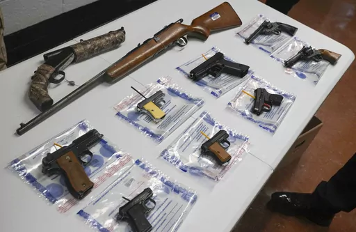 A collection of illegal guns is displayed during a gun buyback event, May 22, 2021, in Brooklyn, N.Y. In the latest legal upheaval since a major Supreme Court ruling on gun rights, a federal appeals court has ruled against a law that bans drug unlawful users from having guns. The opinion handed down Wednesday, Aug. 10, 2023, overturned the conviction of a Mississippi man, finding past drug use shouldn't automatically ban people from possessing guns. (AP Photo/Bebeto Matthews, File)