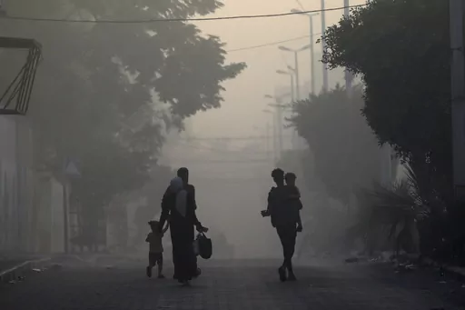 Palestinians flee the Naser neighborhood following Israeli airstrike on Gaza City, Wednesday, Nov. 8, 2023. Israel's military offensive has turned much of northern Gaza into an uninhabitable moonscape. When the war ends, any relief will quickly be overshadowed by the dread of displaced families for their future. (AP Photo/Abed Khaled, File)