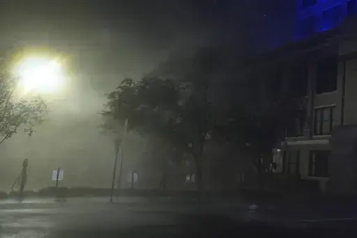 Wind-driven rain soaks a street in downtown Tampa, Fla., during the passage of Hurricane Milton, Wednesday, Oct. 9, 2024. (AP Photo/Rebecca Blackwell)