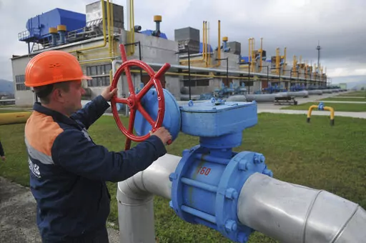 A worker at a Ukrainian gas station Volovets in western Ukraine on Oct. 7, 2015. European governments are scrambling to reduce their energy dependency on Russia and bracing for potential disruption to critical natural gas supplies as the war in Ukraine sends prices to record highs. Natural gas prices hit a new record high Thursday as restrictions on oil and gas supplies — either through Western sanctions or Russian retaliation — was increasingly treated as a possibility on the eighth day of 