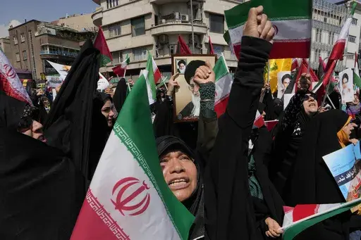 Iranian worshippers chant slogans during an anti-Israeli gathering after Friday prayers in Tehran, Iran, Friday, April 19, 2024. The apparent crash of a helicopter carrying Iranian President Ebrahim Raisi, the country's foreign minister and other top officials is likely to reverberate across the Middle East. Tensions have soared since the start of the Israel-Hamas war, and Israel and Iran directly traded fire for the first time ever in April. (AP Photo/Vahid Salemi, File)
