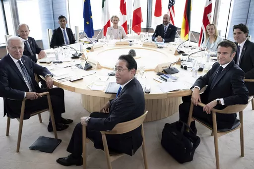 Clockwise from left, U.S. President Joe Biden, Germany's Chancellor Olaf Scholz, Britain's Prime Minister Rishi Sunak, European Commission President Ursula von der Leyen, President of the European Council Charles Michel, Italy's Premier Giorgia Meloni, Canada's Prime Minister Justin Trudeau, France's President Emmanuel Macron and Japan's Prime Minister Fumio Kishida attend a meeting during the G7 Leaders' Summit in Hiroshima, western Japan Friday, May 19, 2023. The Group of Seven advanced econom