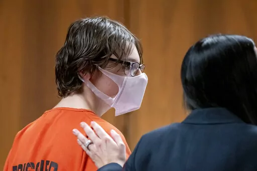 Ethan Crumbley attends a hearing at Oakland County Circuit Court in Pontiac, Mich., on Feb. 22, 2022. Crumbley, the teenager accused of killing four fellow students and injuring more at Oxford High School in Oxford, Mich., is expected to plead guilty next week, authorities said Friday, Oct. 21, 2022. (David Guralnick/Detroit News via AP, Pool, File)