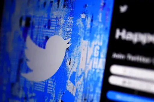 The Twitter splash page is seen on a digital device, Monday, April 25, 2022, in San Diego. Elon Musk’s Twitter acquisition and his plans for a more hands-off approach to moderating content is clashing with ambitious new laws in Europe that are meant to protect users from disinformation, hate speech and other harmful material. Musk, who describes himself as a “free speech absolutist,” pledged to buy Twitter for $44 billion this week. (AP Photo/Gregory Bull, File)