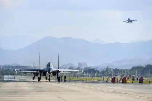 In this photo released by China's Xinhua News Agency, air force and naval aviation corps of the Eastern Theater Command of the Chinese People's Liberation Army (PLA) fly planes at an unspecified location in China, Aug. 4, 2022. The Chinese air force is sending fighter jets and bombers to Thailand for a joint exercise with the Thai military on Sunday, Aug. 14, 2022. (Fu Gan/Xinhua via AP, File)