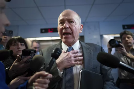 Boeing CEO Dave Calhoun speaks briefly with reporters after a meeting in the office of Sen. Mark Warner, D-Va., at the Capitol in Washington, Wednesday, Jan. 24, 2024. Part of the Boeing 737 MAX 9 fleet was grounded following a mid-air cabin panel blowout on an Alaska Airlines flight. (AP Photo/J. Scott Applewhite)