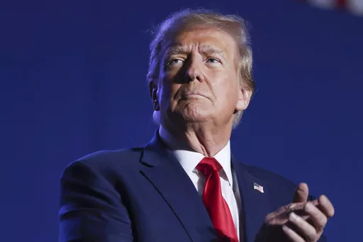 Former President Donald Trump speaks at a campaign rally, Saturday, Dec. 16, 2023, in Durham, N.H. Trump is facing criticism for repeatedly harnessing rhetoric once used by Adolf Hitler to argue that immigrants entering the U.S. illegally are “poisoning the blood of our country. Trump insists he had no idea that one of the world’s most reviled and infamous figures once used similar words. (AP Photo/Reba Saldanha, File)