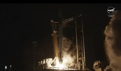 In this image taken from NASA video, a SpaceX Falcon rocket lifts off toward the International Space Station from Launch Pad 39-A, Sunday, March 3, 2024, at Kennedy Space Center in Cape Canaveral, Fla. Four astronauts headed to the International Space Station where they will oversee the arrivals of two new rocketships during their half-year stint. (NASA via AP)