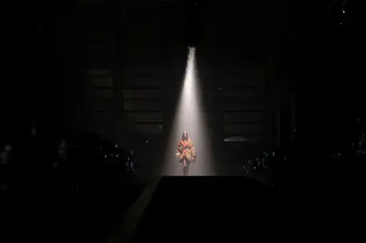 A model wears a creation as part of the Versace Fall/Winter 2025-2026 Womenswear collection presented in Milan, Italy, Friday, Feb. 28, 2025. (AP Photo/Luca Bruno)