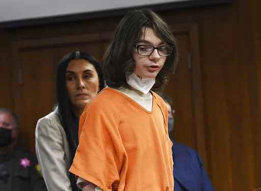 Ethan Crumbley answers yes to charges against him from assistant prosecutor during his pre-trial hearing at Oakland County Courthouse, Monday, Oct. 24, 2022. Pontiac, Mich. Crumbley entered the guilty plea to 24 criminal charges including terrorism causing death and first-degree murder for the Oxford High School shooting. (Clarence Tabb Jr./Detroit News via AP)