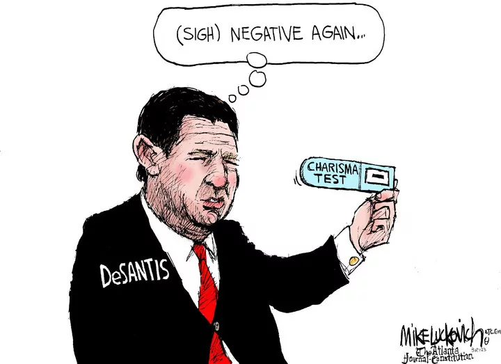 Mike Luckovich for Mar 21, 2023